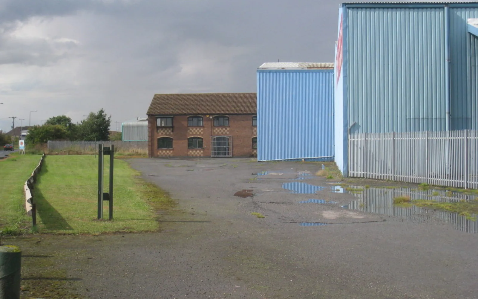 Industrial warehouse and distribution center buildings with metal roofing and large storage facilities